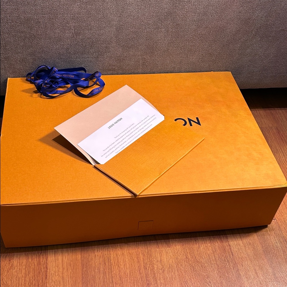 Louis Vuitton Vibrant Orange Box with Blue Ribbon